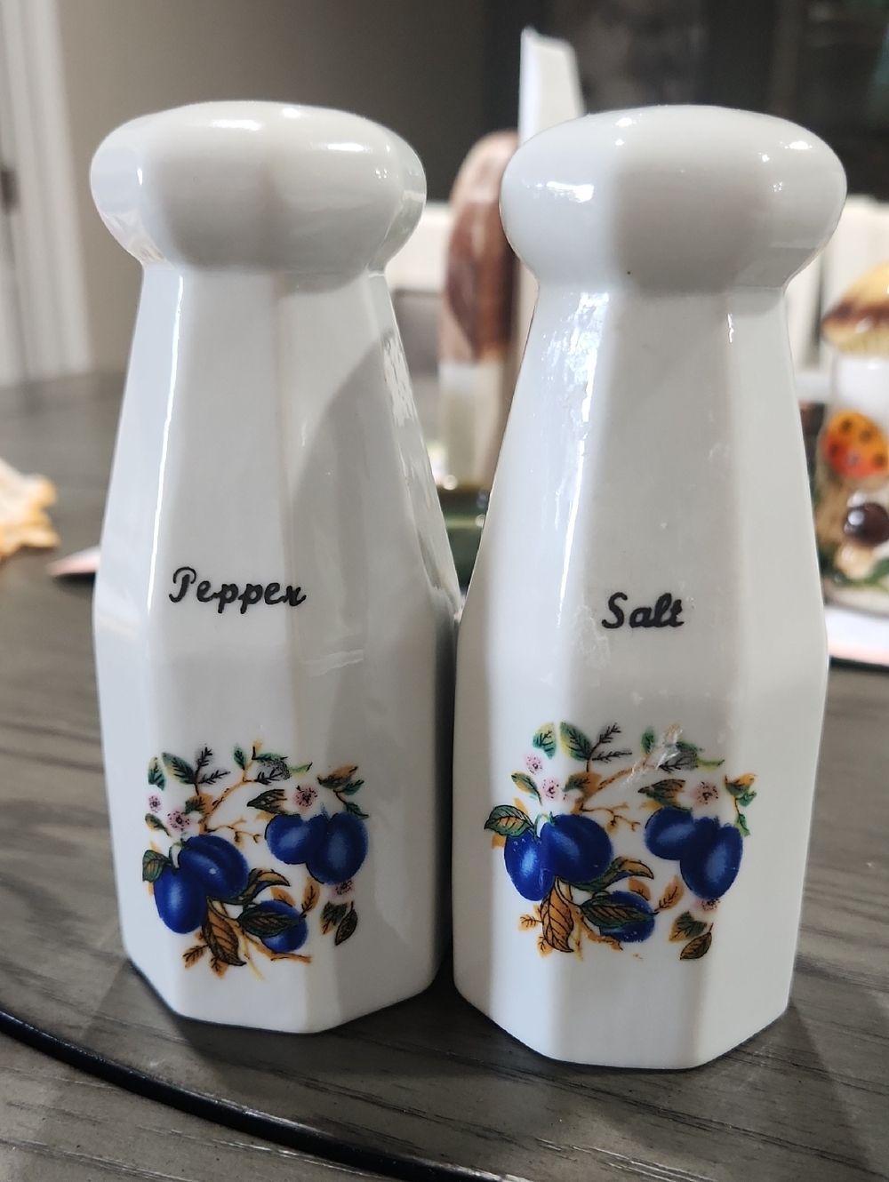 White Ceramic Salt & Pepper Shakers with Blue Fruit Motif